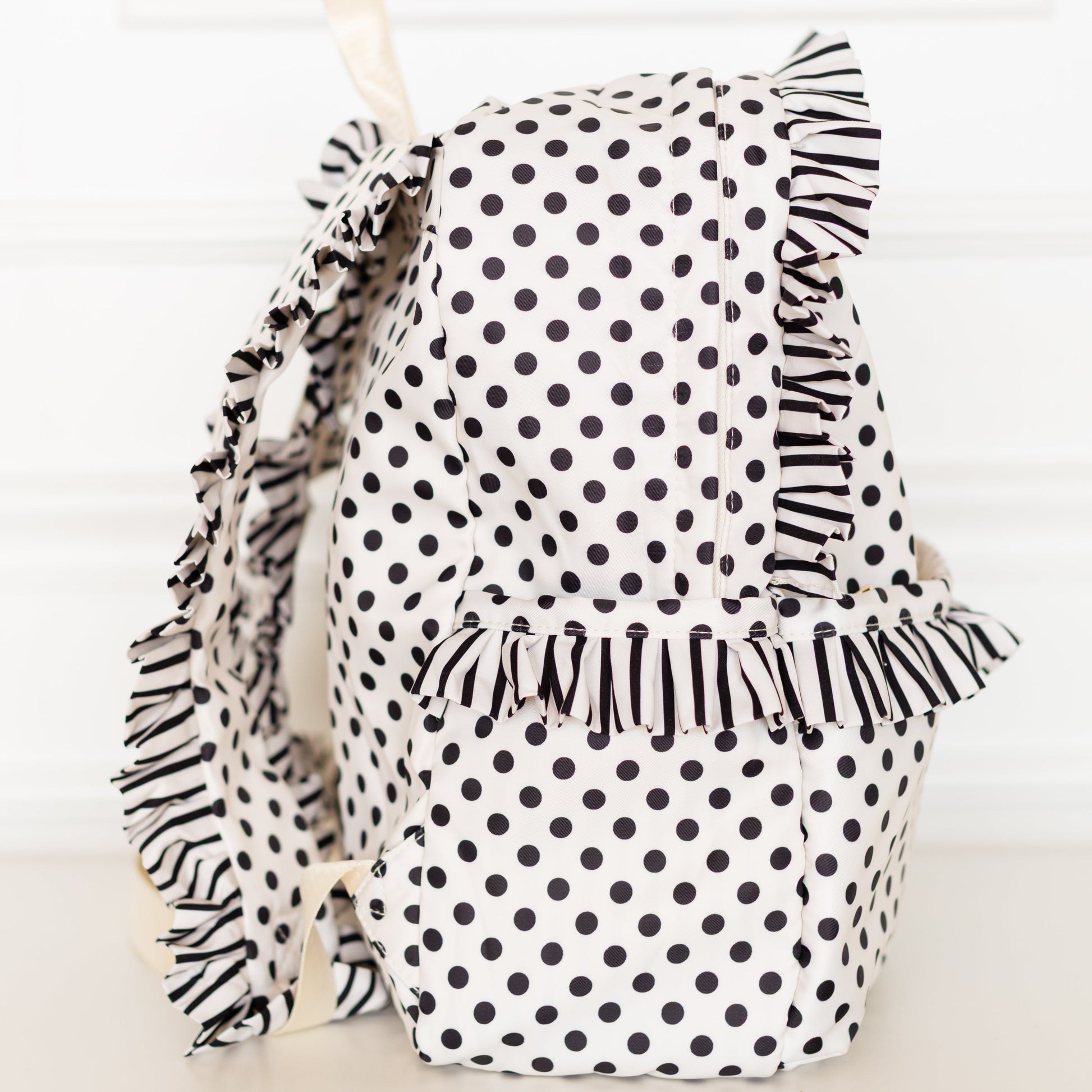 north face black white polka dot backpack JanSport Big Student Classic The front elastic bungee system allows you to easily store and access items like a jacket or helmet Polka Dot Print Backpack